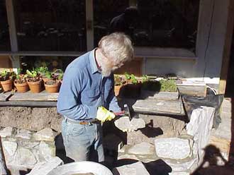 rebuilding GH bed wall with stone